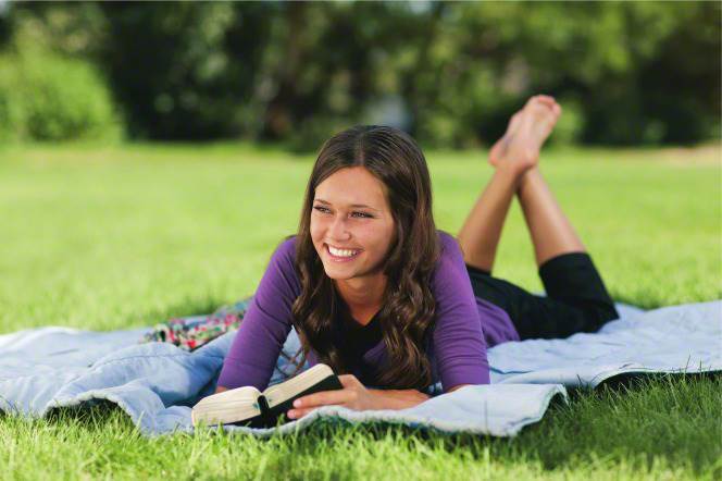 A single young woman finds joy in reading the scriptures
