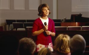 A member sharing a testimony