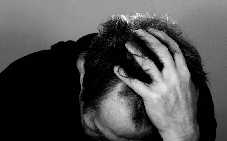 A guy feeling helpless