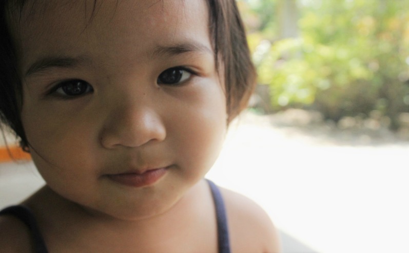 Child helping her parents develop Christlike attributes.