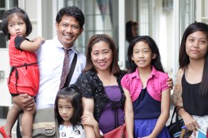 A family attending LDS Sunday Service.