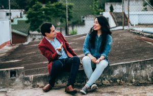 Two people dating on a rooftop