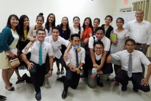 Priesthood leaders together with the Young Single Adults.