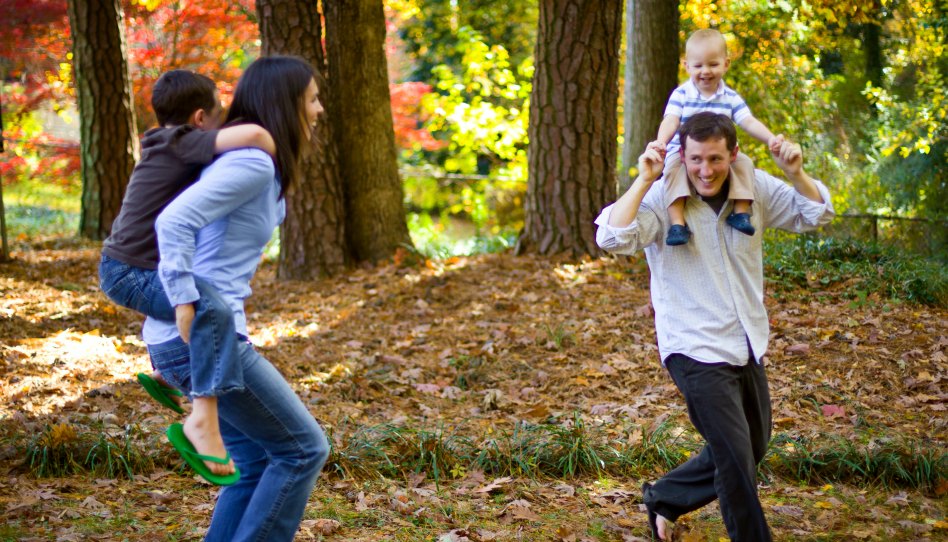 Father playing with family