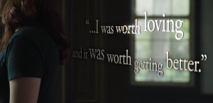 woman facing outside window