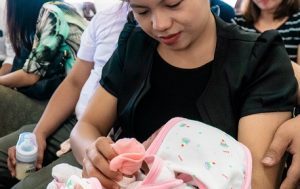 mother holding her baby