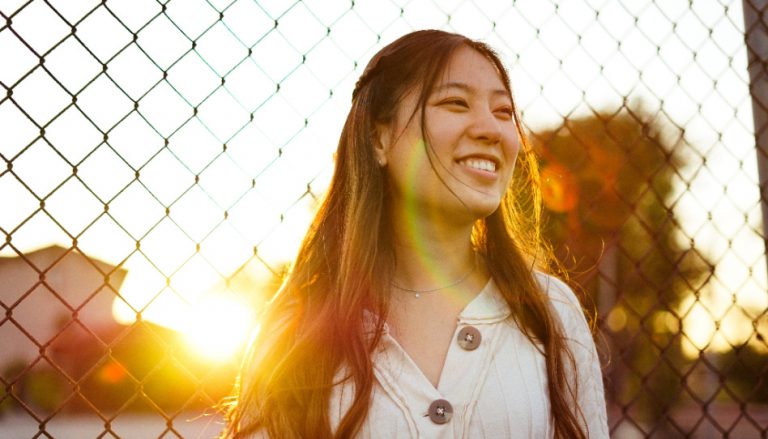 Person laughing after sharing the blessings of quarter-life crisis