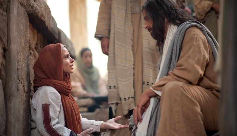 Jesus healing a woman with an issue of blood